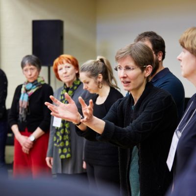 Woman speaking to a group